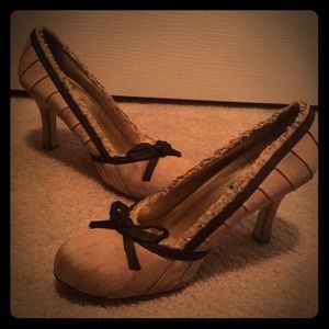 US size 7 light brown and dark brown trim heels.